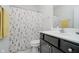 A bathroom with a shower and a modern vanity at 3821 Shady Lake Dr, Westfield, IN 46074