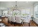 Open dining room with hardwood floors and bright lighting. Overlooks water view at 3821 Shady Lake Dr, Westfield, IN 46074