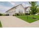Well-maintained home with three-car garage, manicured lawn and lovely curb appeal at 3821 Shady Lake Dr, Westfield, IN 46074