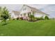 Beautiful two-story home with a manicured lawn and inviting front porch at 3821 Shady Lake Dr, Westfield, IN 46074