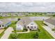 Gorgeous home exterior featuring professional landscaping, brick accents, and a welcoming front porch at 3821 Shady Lake Dr, Westfield, IN 46074
