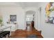 Bright hallway with hardwood floors, leading to a spacious living area at 3821 Shady Lake Dr, Westfield, IN 46074