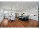 Open kitchen with a large island, stainless steel appliances, and a dining area at 3821 Shady Lake Dr, Westfield, IN 46074