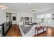Cozy living room with hardwood floors, large windows, and stylish decor at 3821 Shady Lake Dr, Westfield, IN 46074