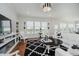 Bright living room with hardwood floors, modern decor, and cozy fireplace at 3821 Shady Lake Dr, Westfield, IN 46074