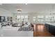 Bright living room with hardwood floors, modern decor, and lake views at 3821 Shady Lake Dr, Westfield, IN 46074