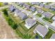 Aerial view of a home with a fenced backyard, showcasing its location in a residential neighborhood at 4253 Ironclad Dr, Bargersville, IN 46106