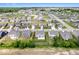 Expansive aerial view showcasing the home's location within a developed community with neatly arranged houses at 4253 Ironclad Dr, Bargersville, IN 46106