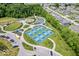 A playground and tennis courts with lush greenery in this planned community at 4253 Ironclad Dr, Bargersville, IN 46106