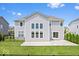 Backyard with a fenced perimeter, a concrete patio, and a lush lawn at 4253 Ironclad Dr, Bargersville, IN 46106