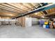 Spacious unfinished basement with visible ceiling beams, ready for customization at 4253 Ironclad Dr, Bargersville, IN 46106
