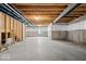 Unfinished basement featuring concrete flooring and exposed ceiling beams at 4253 Ironclad Dr, Bargersville, IN 46106