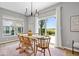 Bright dining area with sliding glass doors leading to the backyard, great natural light at 4253 Ironclad Dr, Bargersville, IN 46106