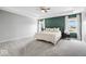 Large main bedroom with tray ceilings, plush carpet, and two windows at 4253 Ironclad Dr, Bargersville, IN 46106
