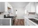 Updated kitchen featuring stainless steel appliances and a pass through at 4502 Evanston Ave, Indianapolis, IN 46205
