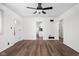 Open living room featuring modern floors with views into the kitchen at 4502 Evanston Ave, Indianapolis, IN 46205