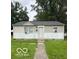 Charming single-story home with neutral siding, manicured lawn, and inviting front entrance at 4744 E 33Rd St, Indianapolis, IN 46218