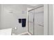 Bathroom featuring a glass-enclosed shower and coordinated decor at 5011 Amber Creek Pl # 310, Indianapolis, IN 46237