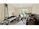 Spacious bedroom with natural light, neutral carpet, and large window views at 5011 Amber Creek Pl # 310, Indianapolis, IN 46237