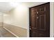 Hallway featuring a decorative wall trim with door on the right at 5011 Amber Creek Pl # 310, Indianapolis, IN 46237