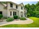 Close exterior showcases manicured yard, stone facade, & cement walkway at 5055 Turkey Track Rd, Martinsville, IN 46151