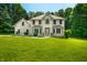 Stunning two-story home with a well-manicured lawn and professional landscaping at 5055 Turkey Track Rd, Martinsville, IN 46151
