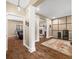 Spacious living room features hardwood floors, elegant columns, and an open floor plan perfect for entertaining at 5055 Turkey Track Rd, Martinsville, IN 46151