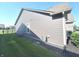 Exterior view of the home featuring wood siding, a manicured lawn, and professional landscaping at 5103 Covington Ave, McCordsville, IN 46055