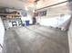 Spacious two car garage providing ample space for parking and storage solutions at 5103 Covington Ave, McCordsville, IN 46055
