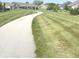 Enjoy scenic walking paths through the community with views of homes and well-manicured lawns at 5103 Covington Ave, McCordsville, IN 46055