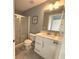 Bathroom featuring a toilet, shower, and sink with white vanity at 520 Ferndale Ln, Danville, IN 46122