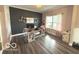 Well-lit office space, perfect for remote work and decorated with shelving at 520 Ferndale Ln, Danville, IN 46122