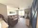 Cozy living room with modern design elements and comfortable sectional at 520 Ferndale Ln, Danville, IN 46122