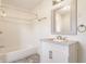 White bathroom with subway tile and a modern vanity at 525 Orange St, Indianapolis, IN 46203