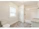 Updated bathroom featuring subway tile and new vanity at 525 Orange St, Indianapolis, IN 46203
