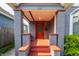 Inviting front porch with brick pillars, offering a welcoming entrance to the home at 525 Orange St, Indianapolis, IN 46203