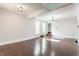 Bright open living area with hardwood floors and ample natural light from the large window at 525 Orange St, Indianapolis, IN 46203