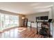 Bright living room featuring a large window, hardwood floors and an exercise area at 535 Radburn Dr, Indianapolis, IN 46214