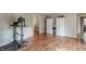 Inviting living space with wood floors, storage cabinets, and an exercise area at 535 Radburn Dr, Indianapolis, IN 46214
