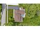 Aerial view of the property, including a large yard, spacious deck, and mature trees at 59 Sycamore Dr, Carmel, IN 46033