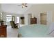 This spacious bedroom offers natural light, vaulted ceilings, carpeted floors, and ample closet space at 59 Sycamore Dr, Carmel, IN 46033