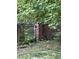 Beautiful brick wall featuring a gated entrance covered with climbing foliage at 6125 N Olney St, Indianapolis, IN 46220