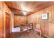Wood paneled hallway featuring classic design elements and natural lighting at 6125 N Olney St, Indianapolis, IN 46220