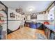 Spacious kitchen featuring decorative tile, stainless appliances and custom shelving at 6125 N Olney St, Indianapolis, IN 46220