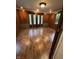 Sunlit room with wood paneling and french doors to the outdoors at 6125 N Olney St, Indianapolis, IN 46220