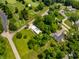 Scenic aerial perspective showcasing a home's location near a golf course, offering both recreation and natural beauty at 6164 Afton Crest, Indianapolis, IN 46220