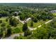 Picturesque aerial view of home near golf course, lake, and lush greenery, in a desirable location at 6164 Afton Crest, Indianapolis, IN 46220