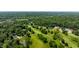 Expansive aerial view of a lush golf course community with beautiful homes and mature trees at 6164 Afton Crest, Indianapolis, IN 46220