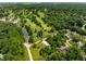 Breathtaking aerial view showcasing golf course, lush greenery, and the neighborhood homes at 6164 Afton Crest, Indianapolis, IN 46220