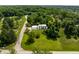 Scenic aerial of home surrounded by lush greenery and tree canopy, creating a private and tranquil setting at 6164 Afton Crest, Indianapolis, IN 46220